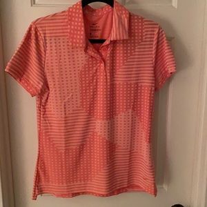 Nike golf shirt.